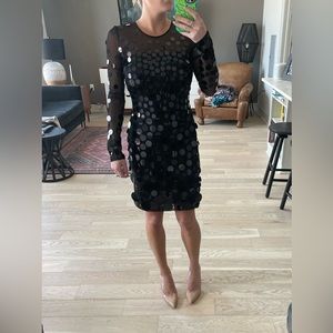 BCBG black mini dress with sheer long sleeves and oversized sequins size S